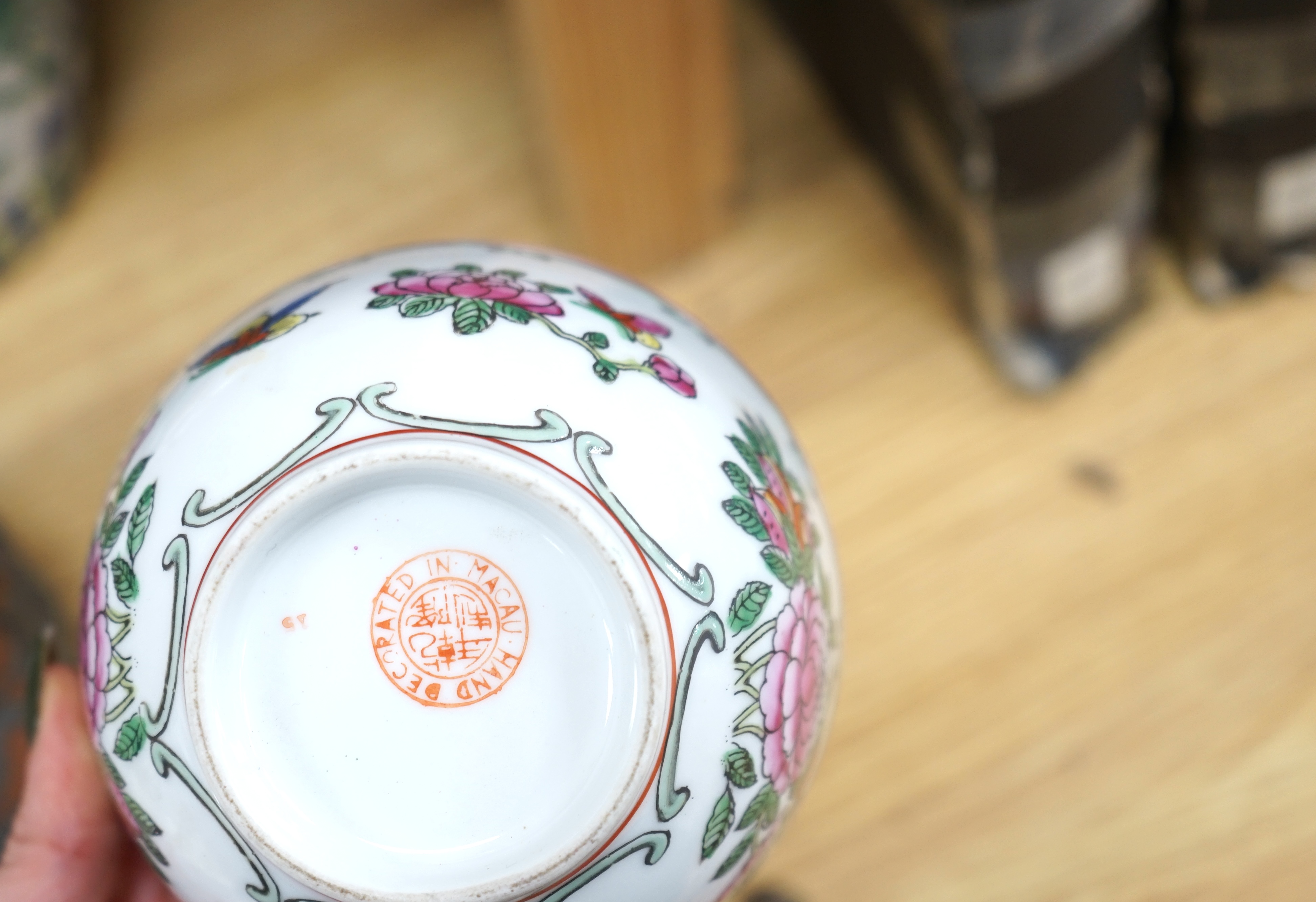 A collection of Chinese ceramics to include and bowls, plates, pottery dragon teapot and a green glaze water carrier, largest 31cm high. Condition - mostly fair